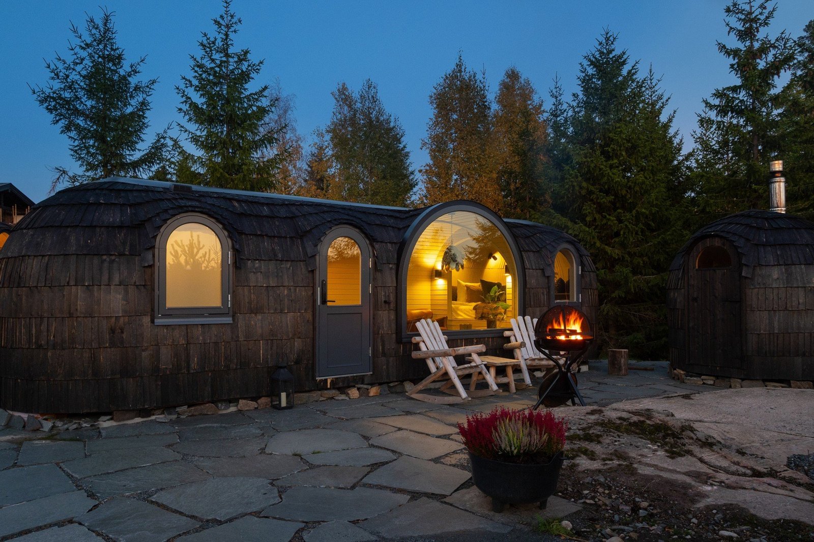 Cabin lit up in the evening
